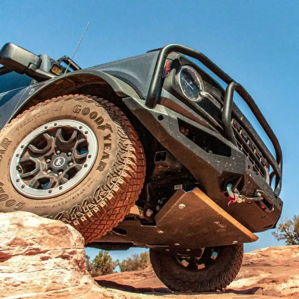 Ford Bronco equipped with Asfir 4x4 front skid plate conquering rocky off-road terrain