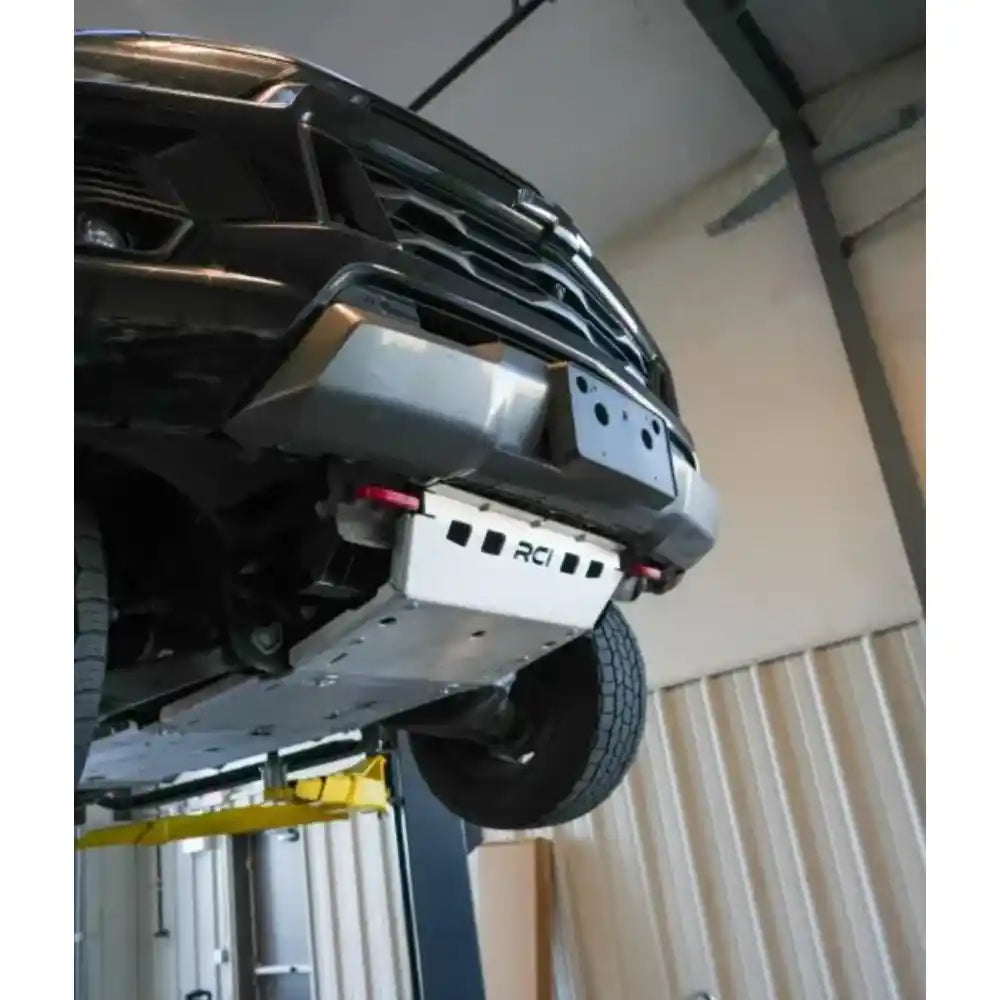 Front differential and engine skid plate close-up on lifted Colorado