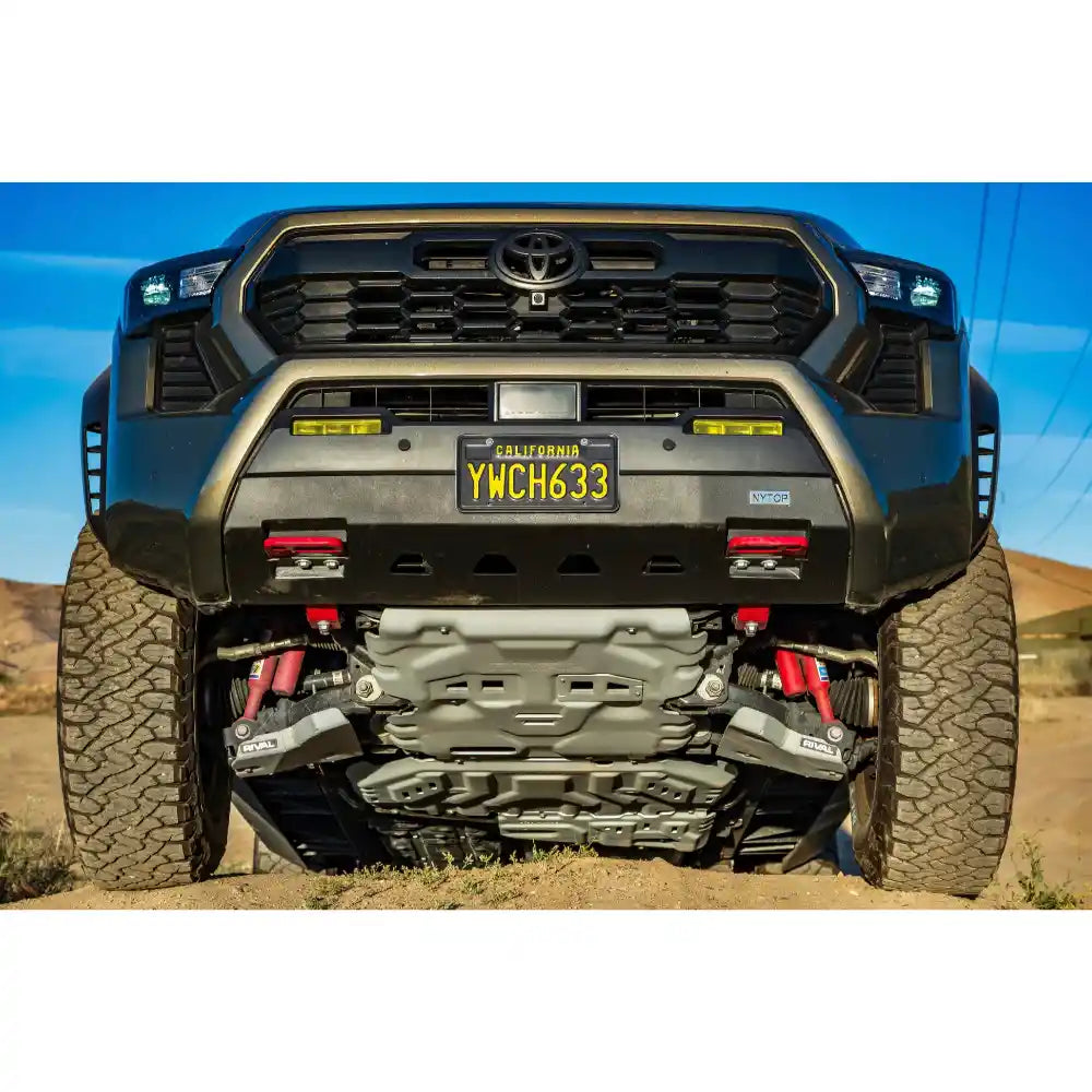 Front view of installed skid plate on tacoma in desert