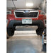 Full front-end RCI lip protection on red Forester