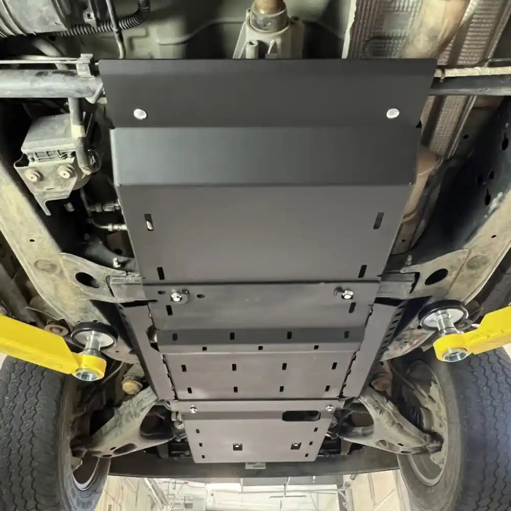 Full modular RCI skid plate coverage on Colorado underbody, including transmission and transfer case sections from below