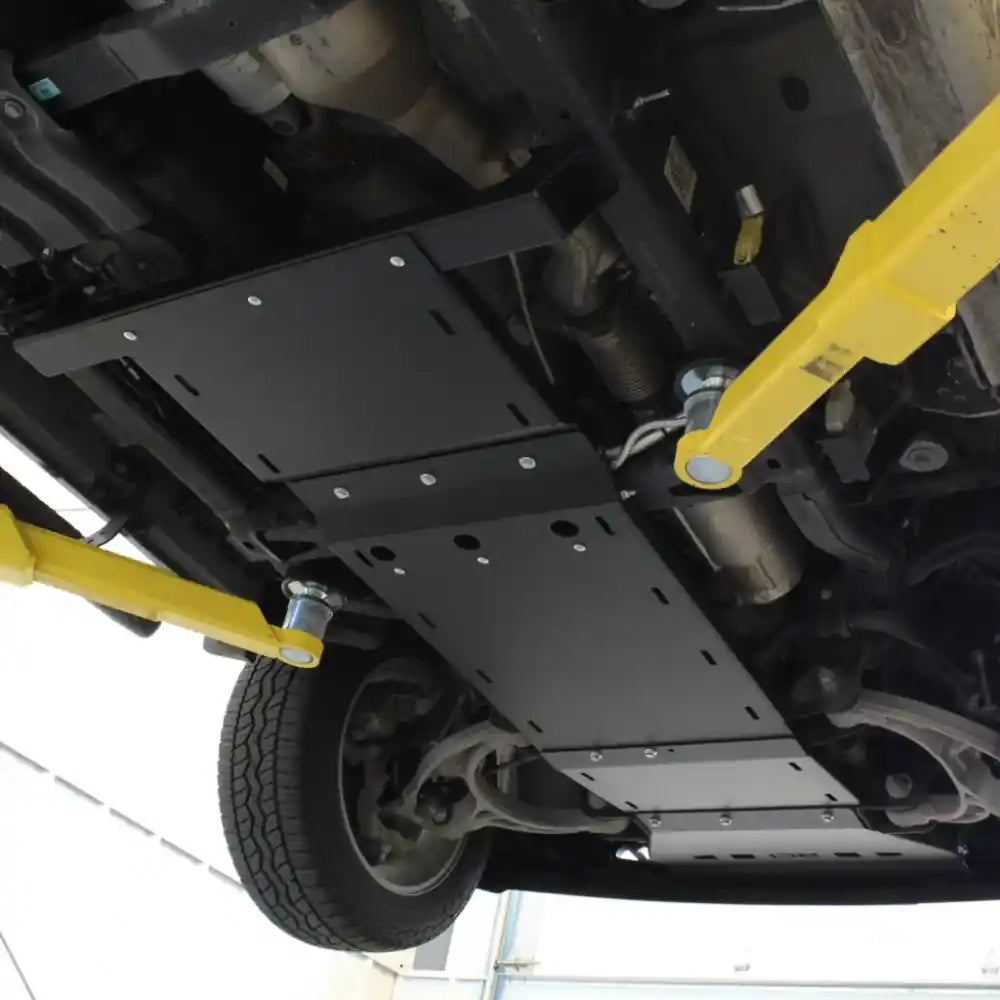 Full underbody shot showing complete RCI skid coverage from front to transfer case