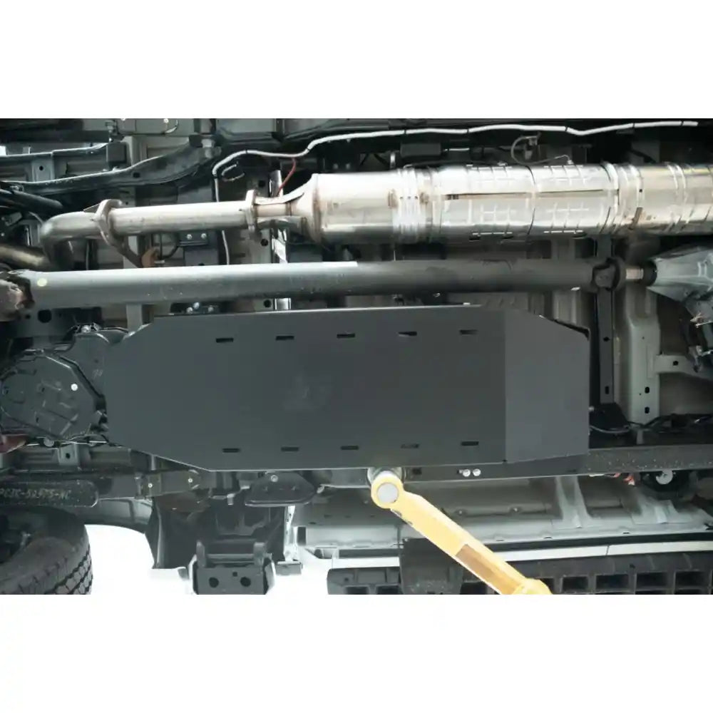 Full underside coverage of RCI fuel tank skid plate with exhaust