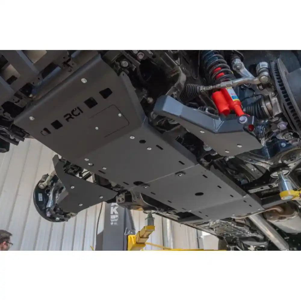 Fully installed RCI skid plate package on 2025+ 4Runner from rear underside angle