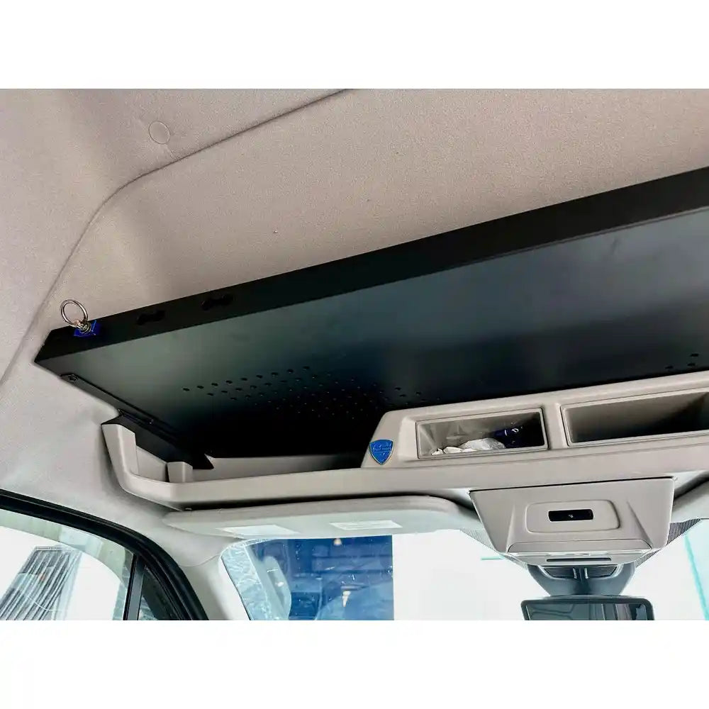 Headliner shelf inside a ford transit.