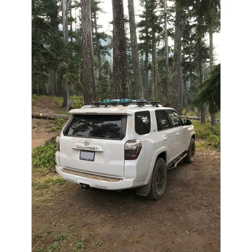 rear angled view of the sliders on white 4runner