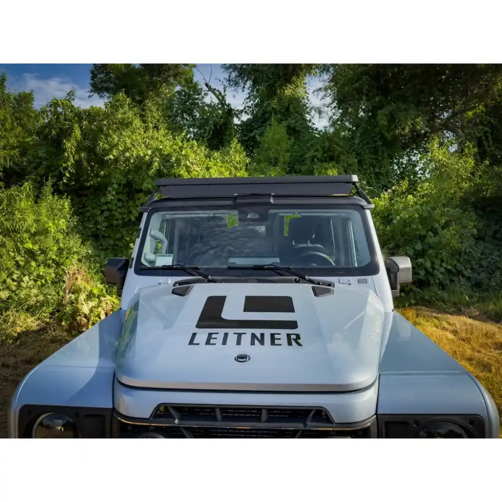 Heavy-duty roof rack installed on Ineos close-up side view