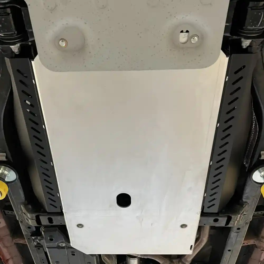 Installed RCI catalytic guard under vehicle with TRD branding visible