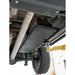 Installed RCI skid plate covering fuel tank from side underbody angle on lifted Colorado