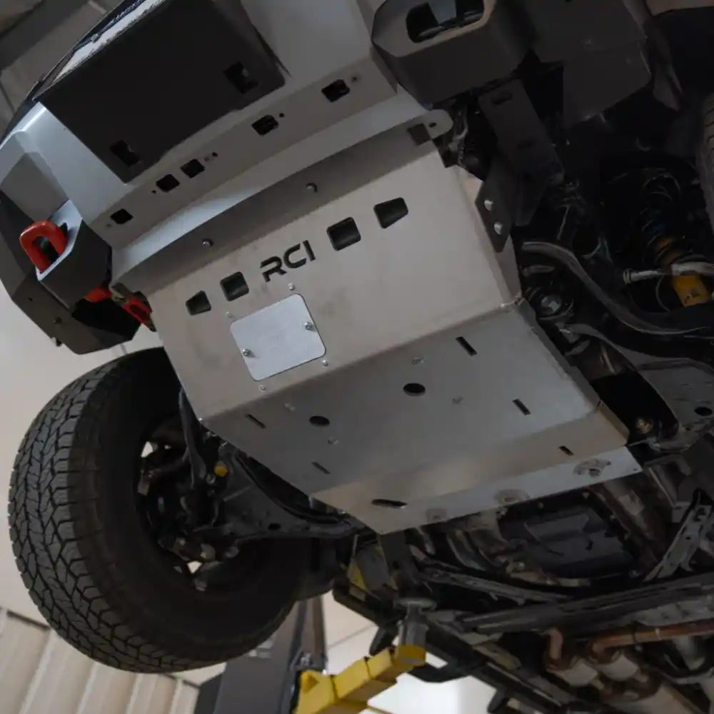 Installed RCI skid plate under lifted Frontier