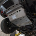 Installed RCI skid plate under lifted Frontier