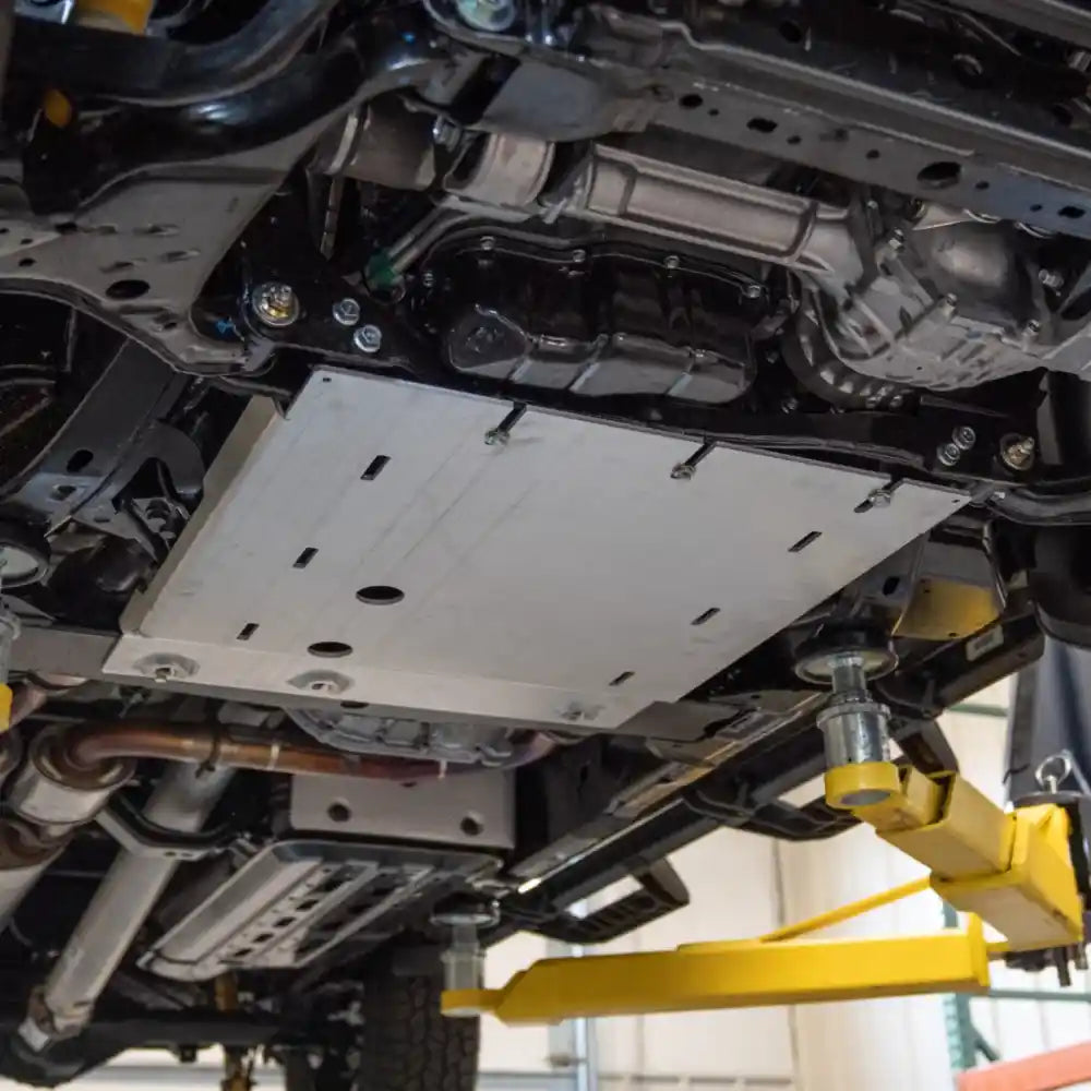 Installed RCI transmission skid plate under Frontier chassis