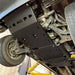Installed black RCI cat guard under Colorado chassis near exhaust components