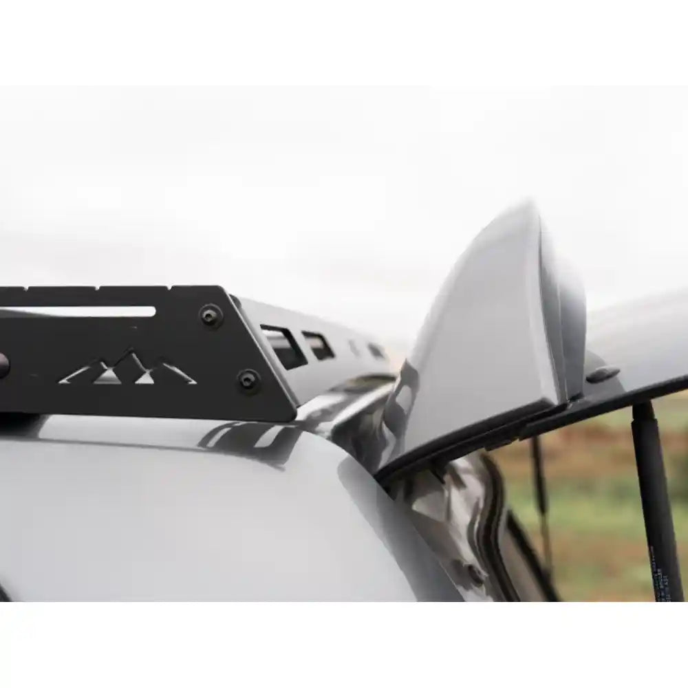 Interior view through GX460 sunroof highlighting RCI rack slats overhead