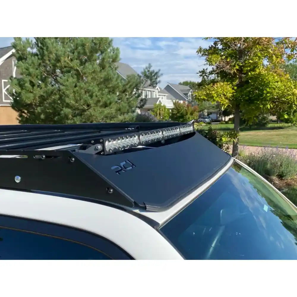 Isolated black RCI full-length rack in product shot, sleek slat design emphasized