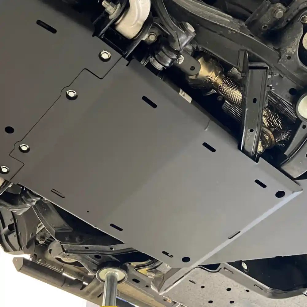 Isolated black RCI transmission skid plate front-facing view