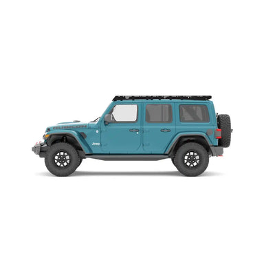 Blue Jeep Wrangler with QDHD Sherpa roof rack on a white background