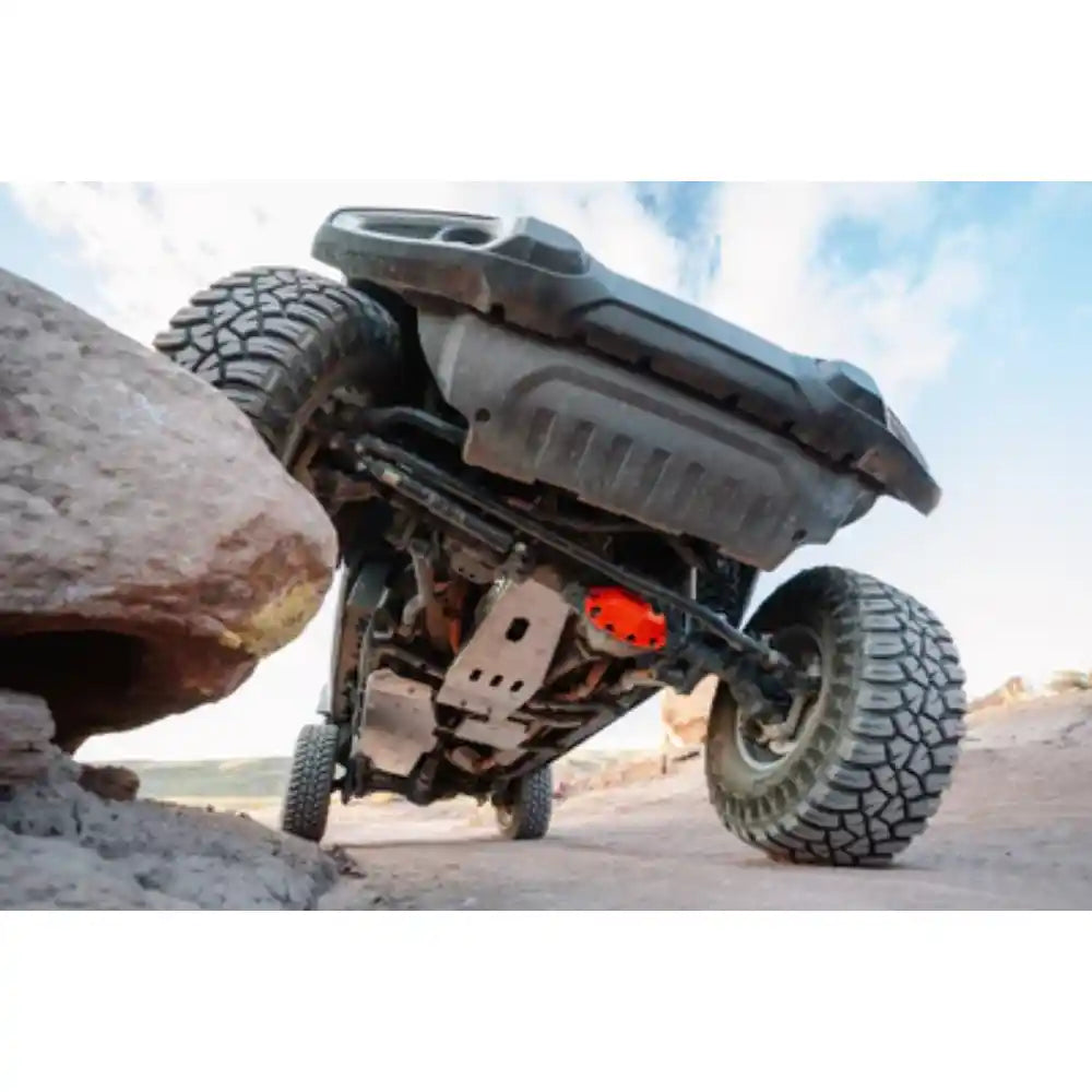 Jeep Gladiator JT climbing rocks with Asfir fuel tank skid plate fully installed.