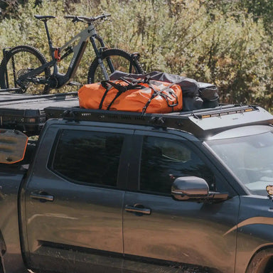Close view of Kilo Roof Rack with Luggage on top