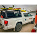 Leitner Designs ACS Bed Rack mounted on white Toyota with loaded cargo