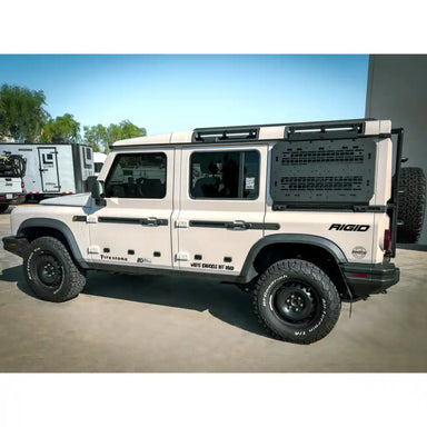 Leitner Designs side kick panel installed on INEOS Grenadier exterior cage