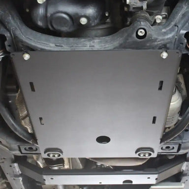Matte black RCI transmission skid plate installed under Toyota vehicle chassis