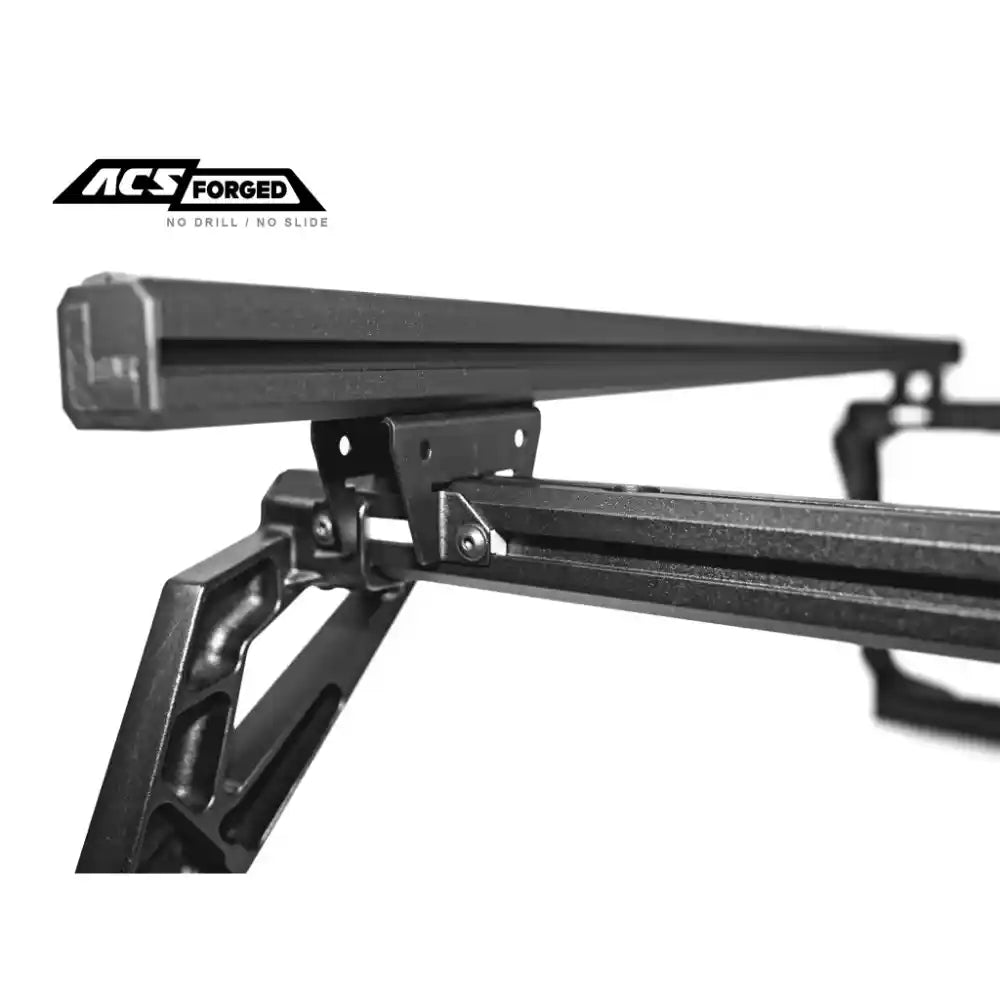 Metal bed rack with ACS Forged logo on a white background
