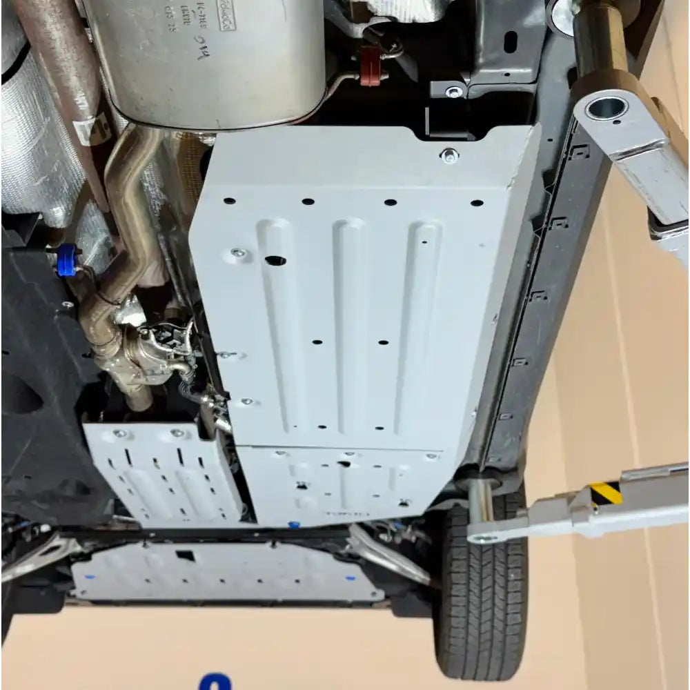 Midsection aluminum skid plates close-up