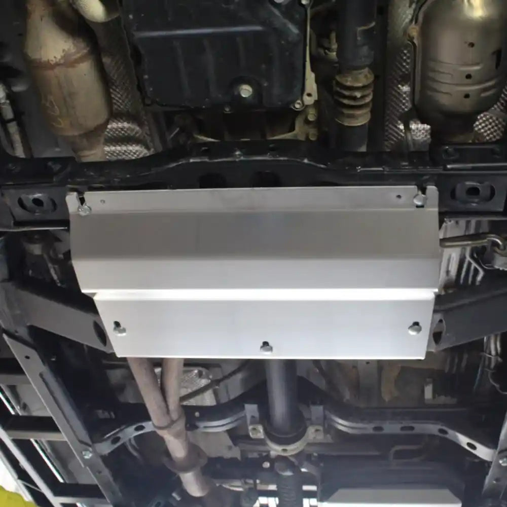 Multi-angle shots of RCI transfer case skid plate system