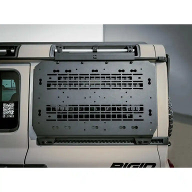 NEOS Grenadier universal accessory panel showing laser-cut mounting slots