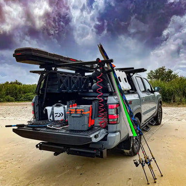 Nissan Tian with installed Leitner Designs ACS Bed Rack with fishing gear and equipment on a beach