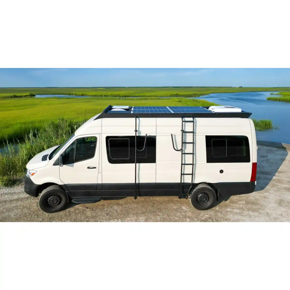 White camper van with solar panels on a scenic background
