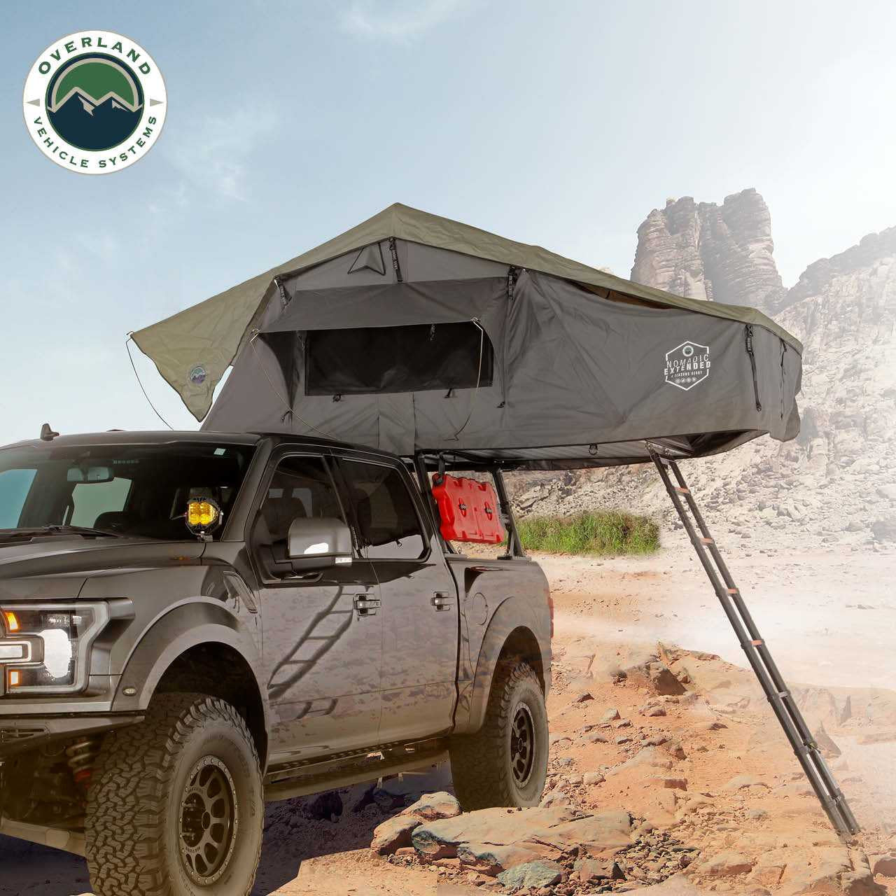 Roof top tent is mounted on a truck with a ladder