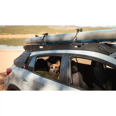 Overlanding gear mounted on Crosstrek roof with window panel