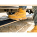 Person wearing yellow boots on a truck step sliders with a natural background