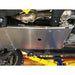Polished stainless steel RCI transmission skid plate on lifted Jeep