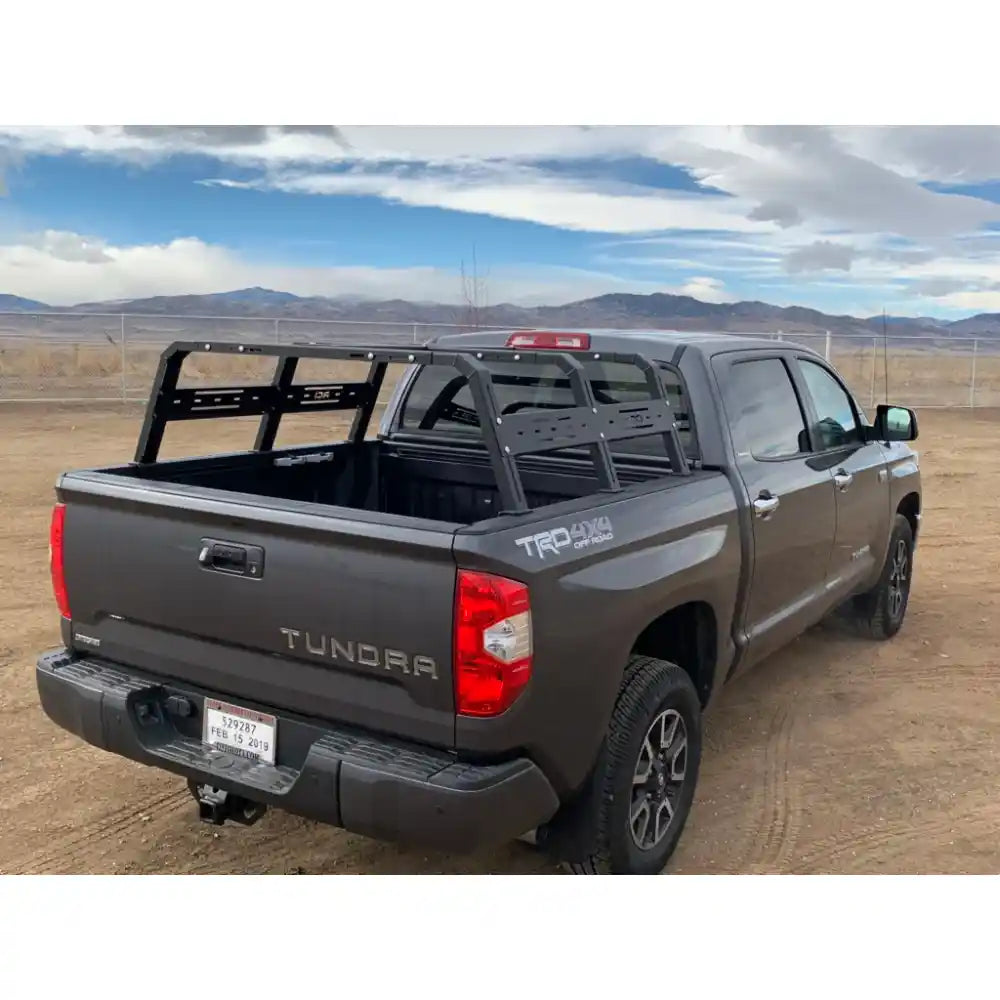 RCI HD bed rack on silver Tacoma in desert