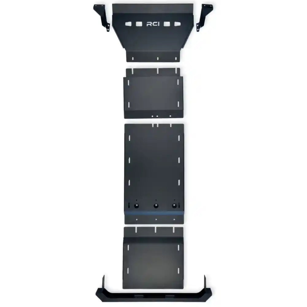 RCI Offroad full skid plate package laid flat, showing multi-section black powder-coated design