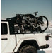 RCI Offroad rack carrying bike and black tent bag on winter Jeep pickup