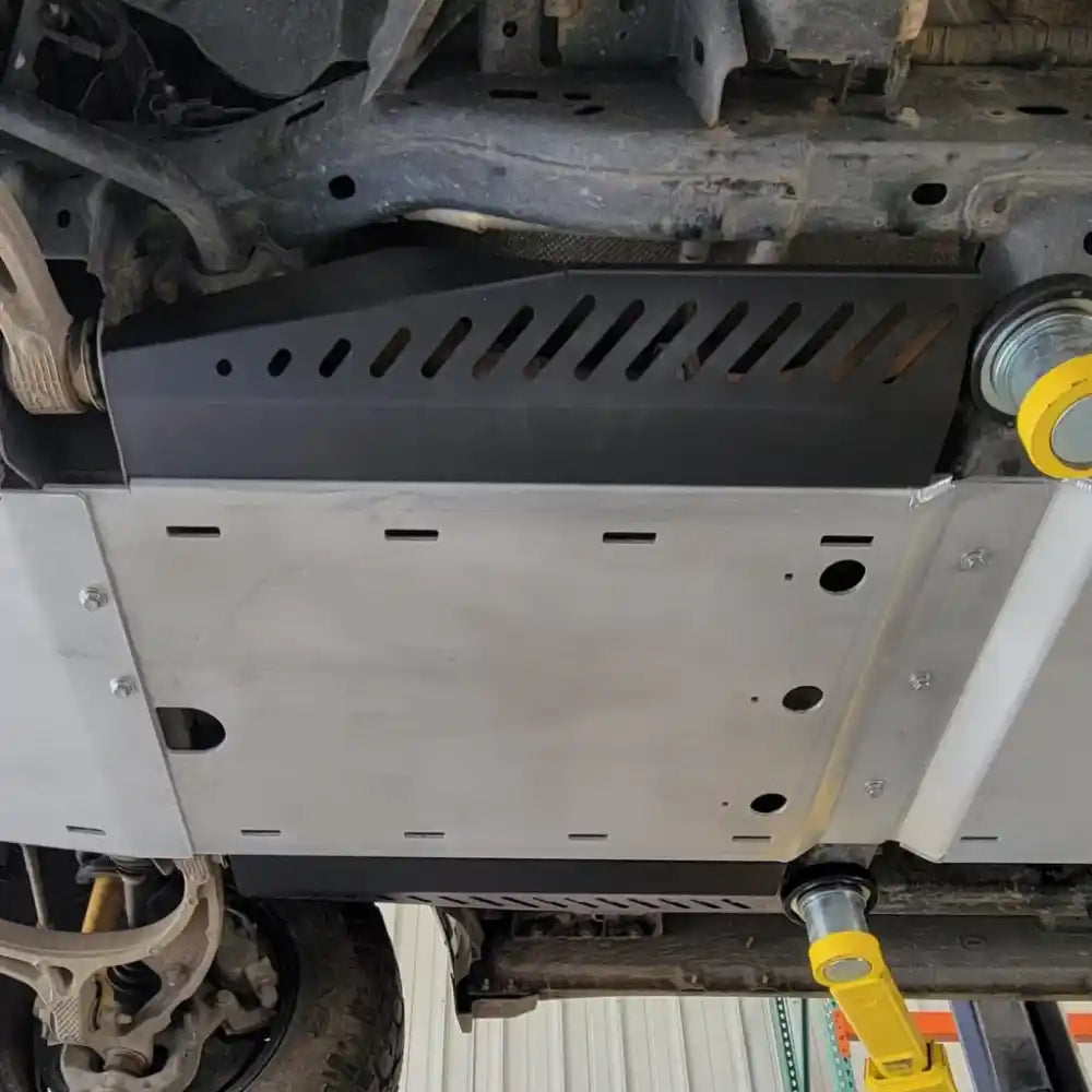 RCI catalytic guard mounted under Ram 1500 exhaust