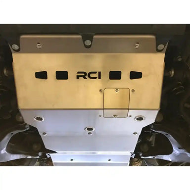 RCI engine skid plate bolted in place, engine bay view