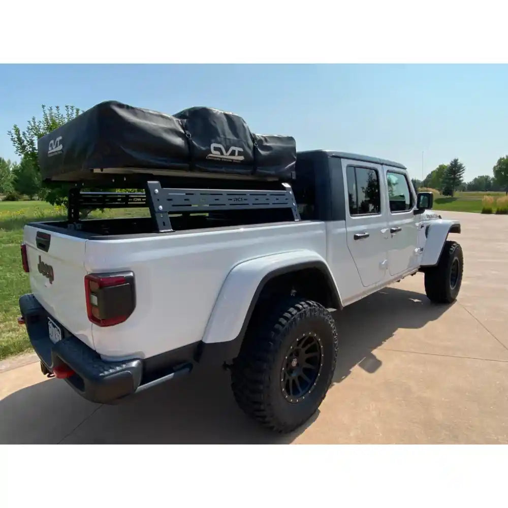 RCI rack with black gear bag on white truck