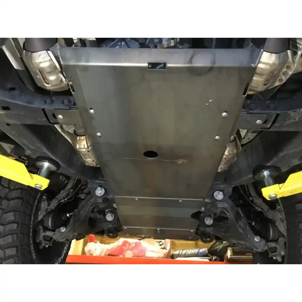 RCI skid plate bolted in place protecting transmission and t-case