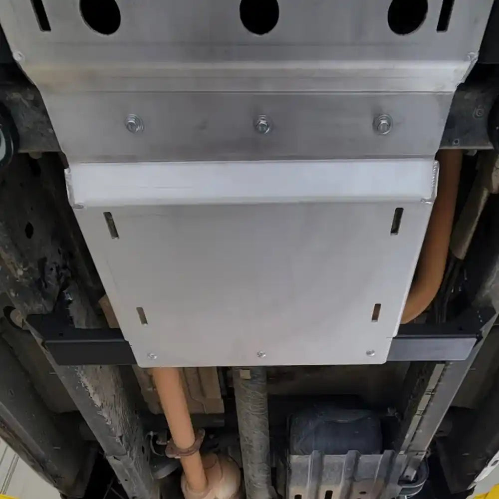 RCI skid plate covering transfer case and driveshafts