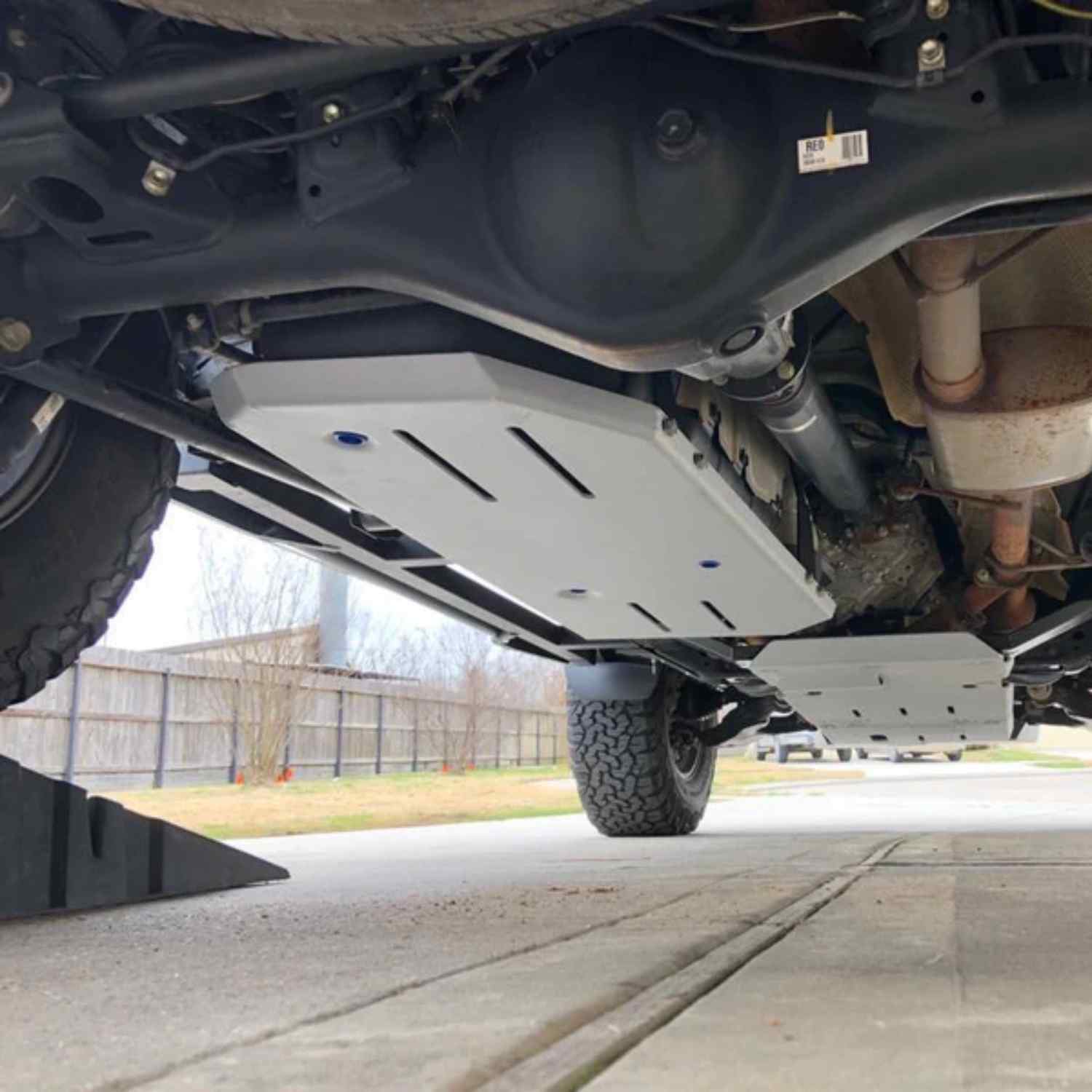 underbody view of the skid plate mounted on lexus