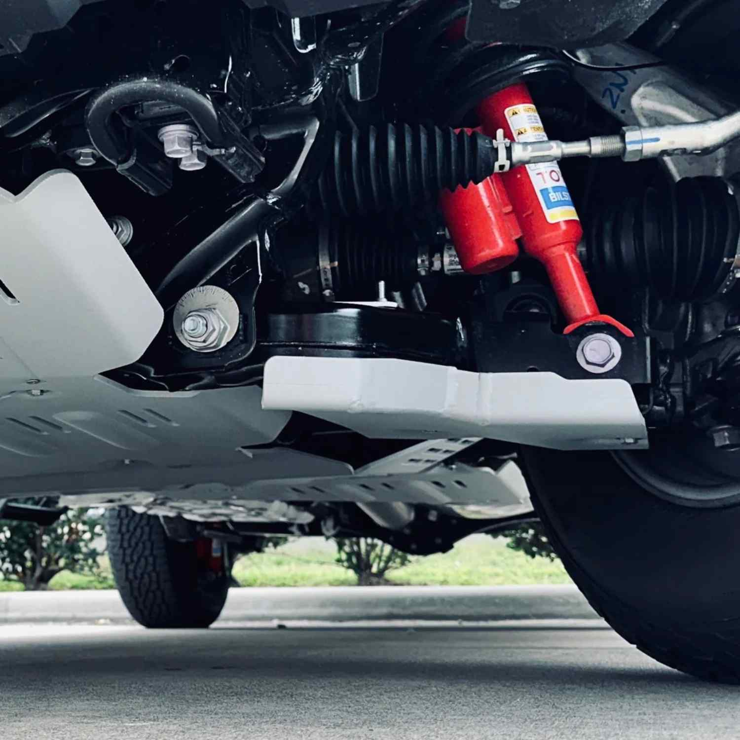 side view of mounted  RIVAL Aluminum Lower Controls Skid Plate Tacoma