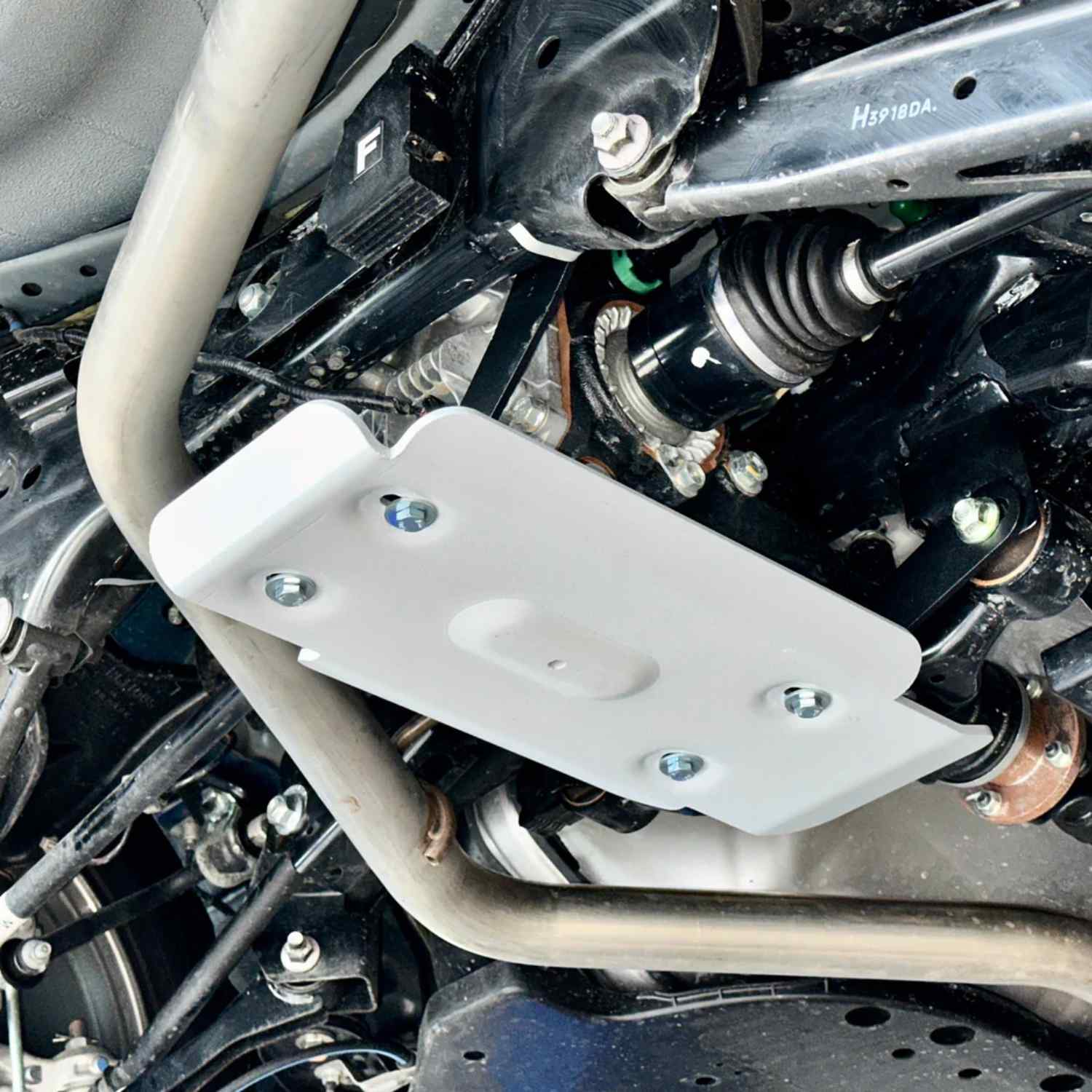 angled view of mounted differential skid plate on Outback
