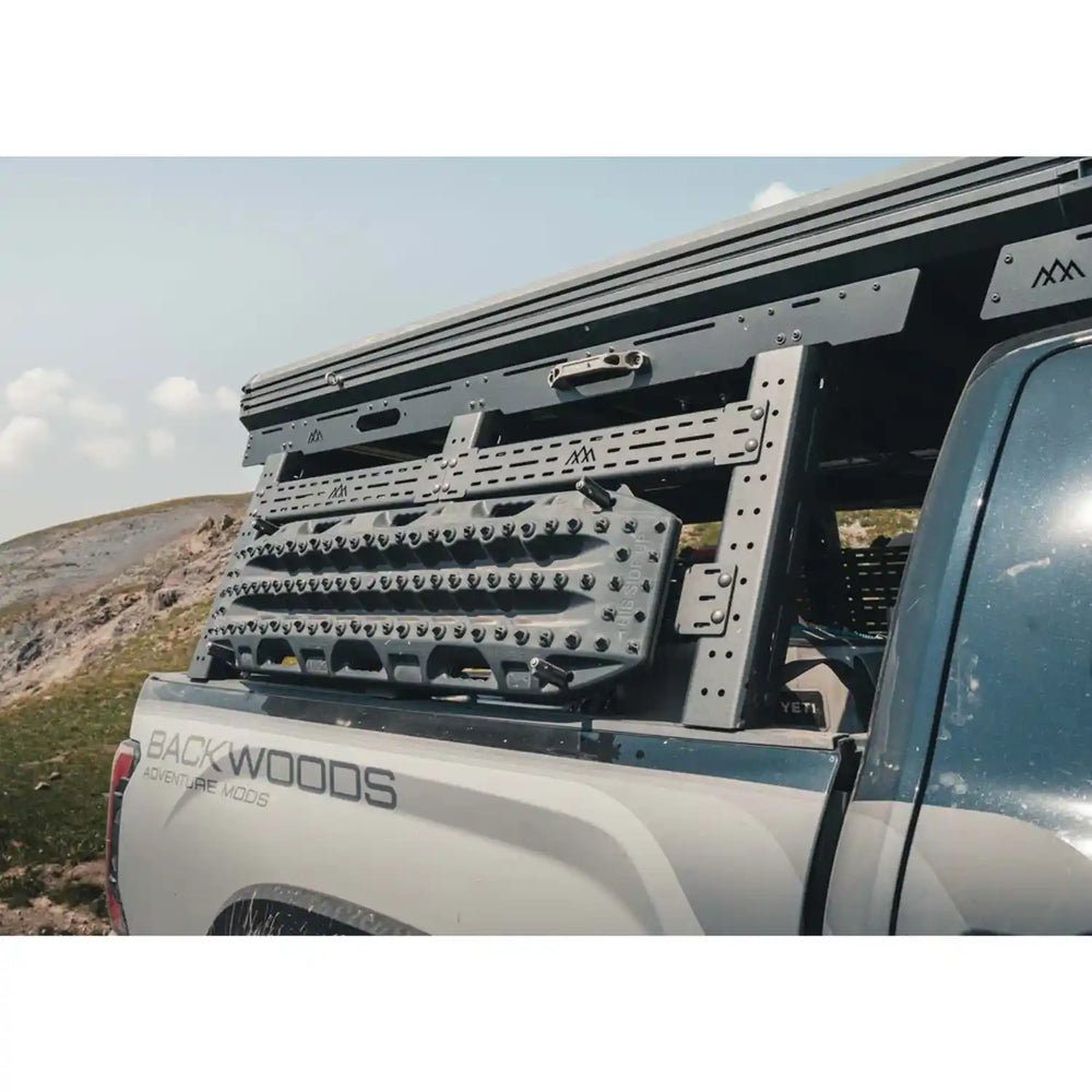 Backwoods truck bed rack on a white Tundra with a mountainous landscape in the background