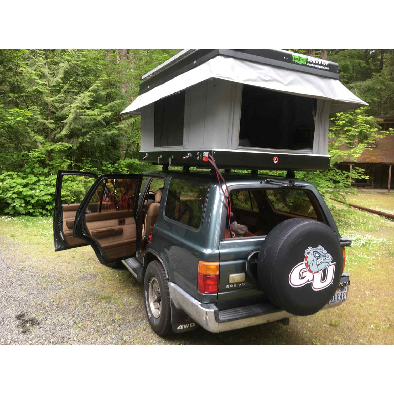 electric car tent Bundutec BunduTop: Luxury Electric Roof Top Tent for Camping — ExtrailAuto
