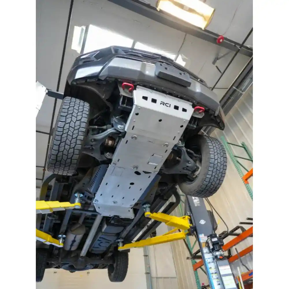 Rear underbody view of installed RCI skid plates on Chevrolet Colorado